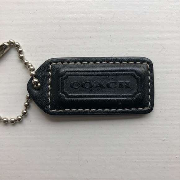 coach dog tag